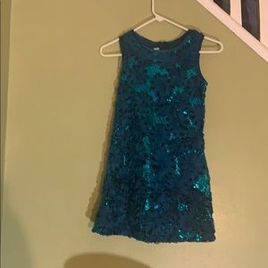 A Turquoise formal dress with flowers